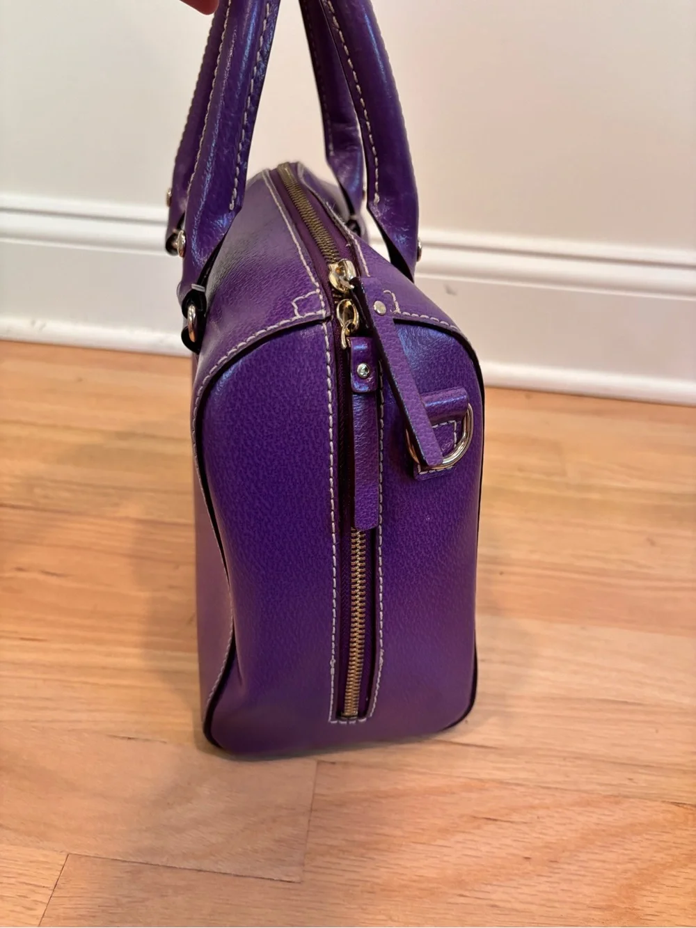 Kate Spade Alessa Wellesley handbag in a vibrant plumberry purple leather
